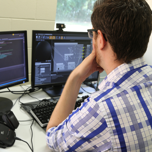 Student using a computer to do cool stuff