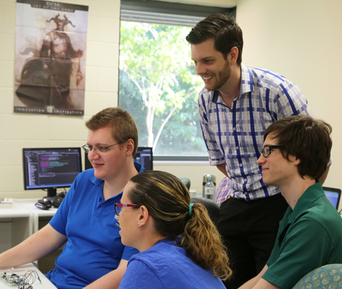 Current and past IT@JCU students working together